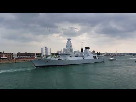 HMS Defender sailing out of Portsmouth  for trials and training.
