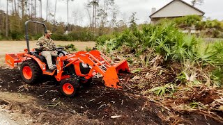 Digging Palmettos with a compact tractor!