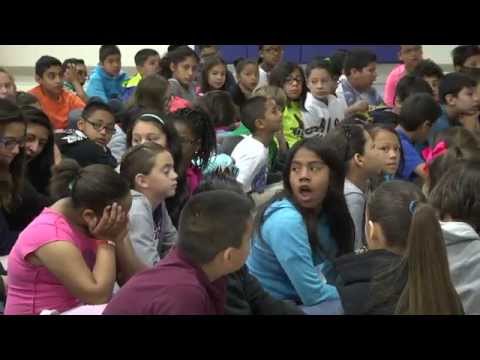 Phillip Cortez reads to Park Elementary students