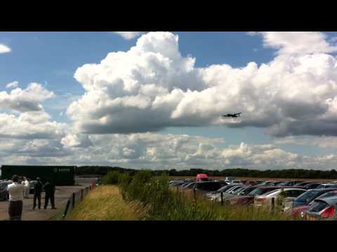 RAF Lancaster over Lotus Cars at Hethel.