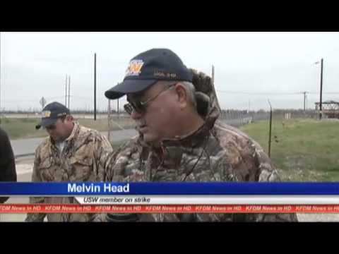 Picketers walk in cold temperatures