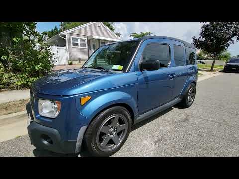 lowered Honda Element on tein lowering springs 18 inch wheels