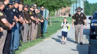 Cops Escort 5-Year-Old Indiana Boy to School After Dad Dies in the Line of Duty