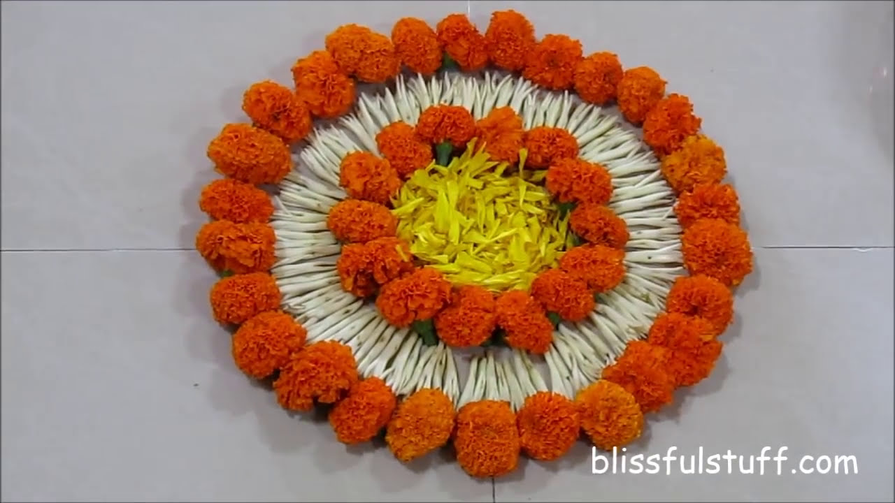 beautiful onam pookalam designs with marigold flowers by poonam borkar