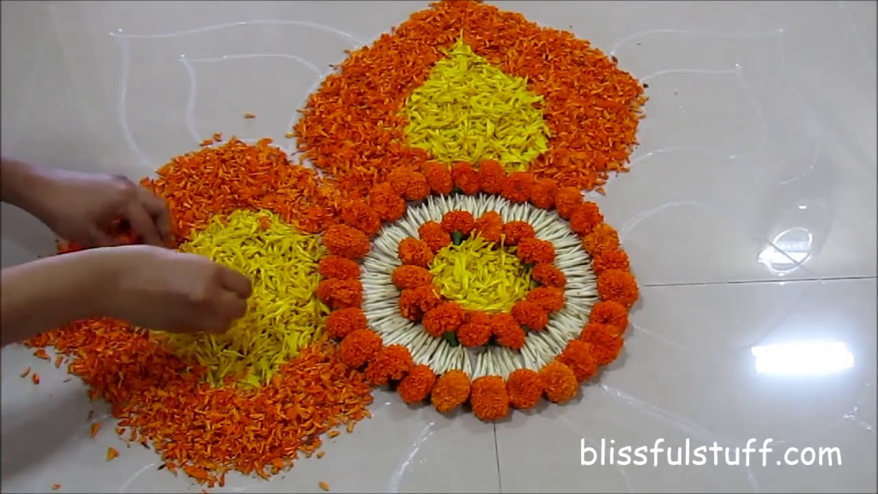 diwali special rangoli design with marigold flowers iii by poonam borkar