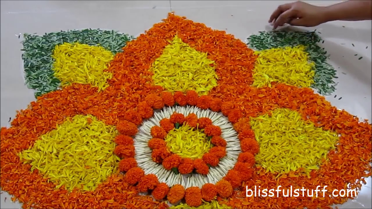 diwali special rangoli design with marigold flowers iii by poonam borkar