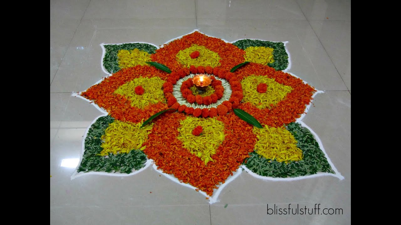 Beautiful onam pookalam designs with marigold flowers by Poonam Borkar