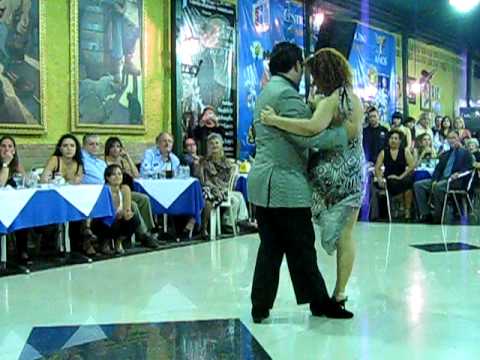  Vilma Fabiana Vega  and  Fernando Galera  are  dancing  to  the  tango  "  Embrujamiento  "
