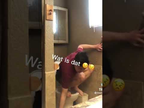 guy falls in the toilet running from spider