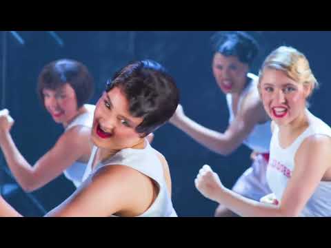Trailer composition: confetti and cream fly as the ensemble sings the finale refrain