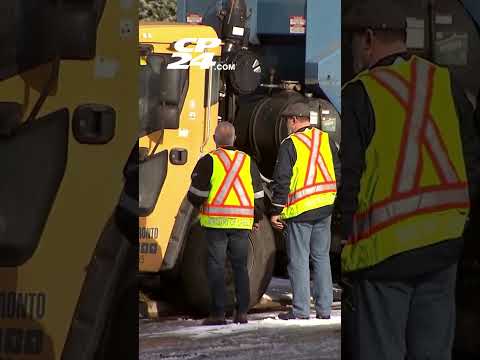 Toronto garbage truck driver struck and killed by his own vehicle
