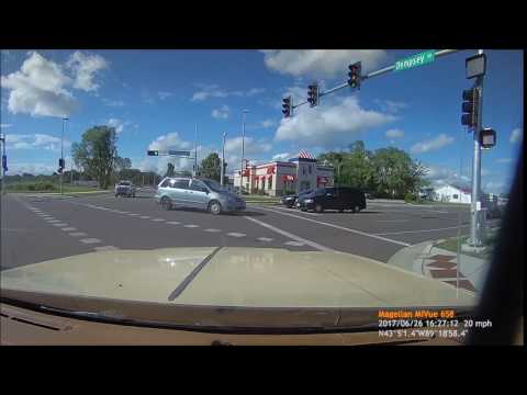 Driver turns left into right lane and almost hits me