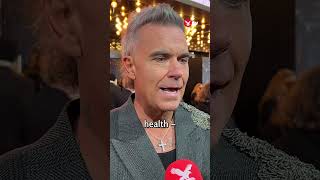 Robbie Williams reflects on career-long fight with mental health #shorts