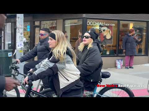 EXCLUSIVE; Madonna tells a fan she does't live in the past while out riding her bike