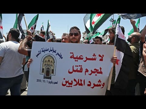 شاهد السوريون في إدلب يصفون الانتخابات الرئاسية بـ"المسرحية والمهزلة" ويرفضون تولي الأسد فترة را…