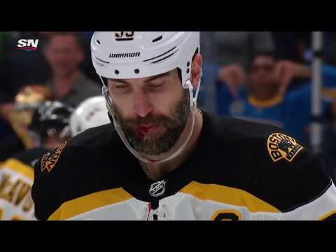 Zdeno Chara takes puck to the face... OUCH...