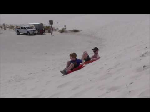 Sand sledding at White Sands - fun for the kids!