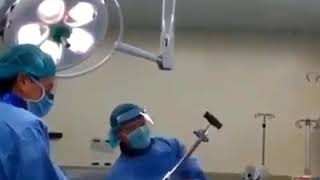 an orthopaedic team removing an intramedullary nai
