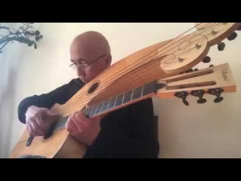 Paolo Giordano amazing harp guitar player