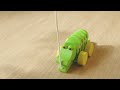 Plantoys Tanzender Alligator/ Krokodil Kautschukholz