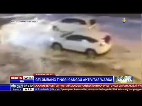 Ombak Tinggi Terjang Pesisir Manado Hingga ke Badan Jalan