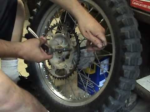 Removing sprocket bolts on a dirt bike or motocross bike or trail motorcycle.MPG