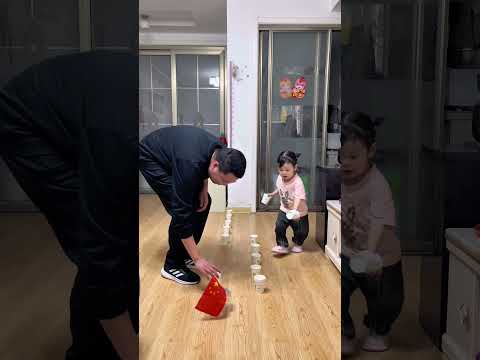 Dad plays fun parent-child games with his daughter