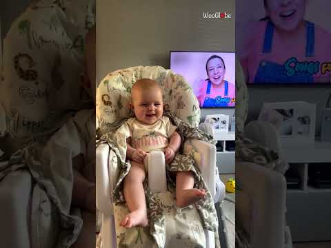 Baby smiles hearing the voice of Ms. Rachel