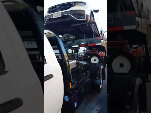 Beautiful  white 5500 Heavy duty Ram truck car hauler trailer full load of vehicles