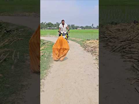 Jumping in front of the motorbike.
