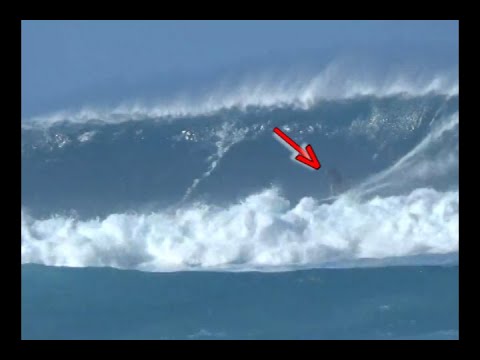Surfing Monstrous waves at Makaha Beach