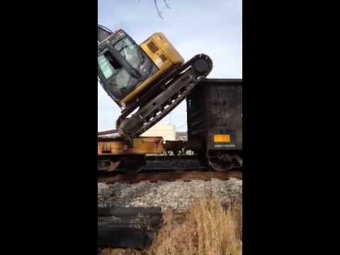 Unloading excavator from rail car