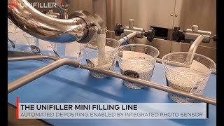 The Unifiller Mini Filling Line for automated, weight-accurate food depositing with high flexibility