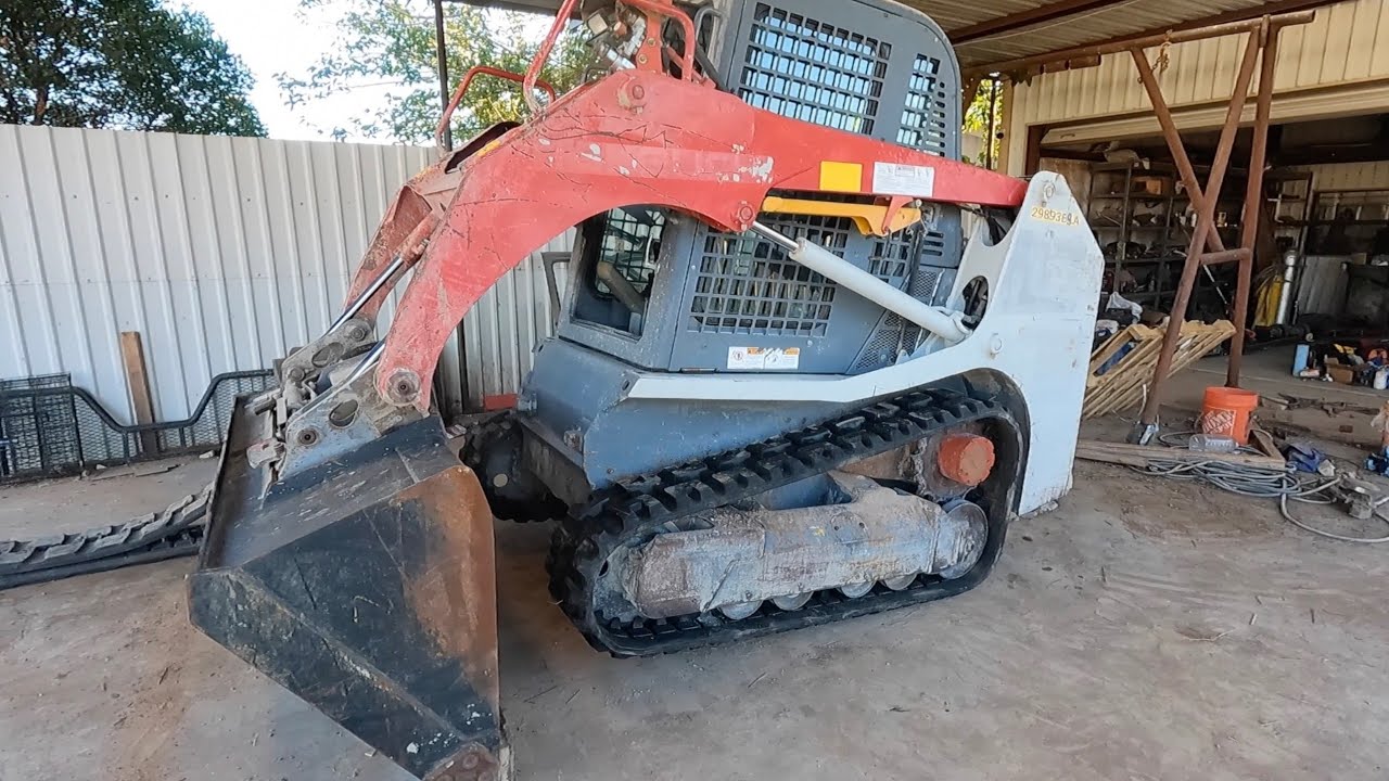 installing new tracks on a 2016 Takeuchi tl8