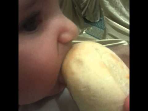 Nesreen tasting bread for the first time