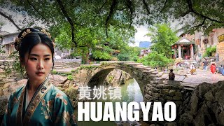 With EpicGlobe Walks . . Huangyao Ancient Town Huangyao Ancient Town, GuangXi province, is a well-preserved historic town known for its ancient architecture, cobblestone streets, and serene environment. Here’s a detailed guide to everything you need to know about this hidden gem. History and Background Huangyao Ancient Town has a history dating back over 1,000 years, with its origins traced to the Song Dynasty (960–1279 AD). It flourished during the Ming (1368–1644) and Qing (1644–1912) dynasties as a bustling commercial hub due to its strategic location along trade routes. The town was named after the dominant Huang and Yao families who settled here. Unlike many other ancient towns in China, Huangyao has retained much of its original charm, avoiding over-commercialization. Architecture and Layout The town is a living museum of Ming and Qing dynasty architecture, with over 300 well-preserved ancient buildings. Key architectural features include: Black Tiles and White Walls: Traditional southern Chinese-style buildings with black-tiled roofs and whitewashed walls. Cobblestone Streets: The narrow, winding streets are paved with smooth cobblestones, polished by centuries of foot traffic. Courtyard Houses: Many homes feature central courtyards, reflecting traditional Chinese family life. Ancient Bridges: Stone bridges, such as the Dai Long Bridge, connect different parts of the town and add to its picturesque charm. Main Attractions Here’s a detailed look at the must-see spots in Huangyao: 1. Dai Long Bridge (带龙桥) A stunning ancient stone bridge that spans the Peacock River. Offers breathtaking views, especially during sunrise or sunset when the water reflects the surrounding karst mountains. A popular spot for photography and quiet contemplation. 2. Ancient Banyan Trees Huangyao is home to several ancient banyan trees, some over 1,000 years old. The most famous is the `Couple Tree`, where two banyan trees have grown intertwined, symbolizing love and unity. 3. Baozi Mountain (宝珠山) A small hill located in the center of the town, offering panoramic views of Huangyao and its surroundings. At the top, you’ll find the Baozi Mountain Temple, a quiet place for reflection. 4. Ancestral Halls and Temples Huang Family Ancestral Hall: A well-preserved hall showcasing the history and achievements of the Huang family. Ouyang Temple: Dedicated to the Ouyang family, another prominent clan in the town. Guanyin Temple: A small temple dedicated to Guanyin, the Goddess of Mercy. 5. Peacock River (孔雀河) The river winds through the town, lined with ancient buildings and lush greenery. Visitors can take a bamboo raft ride to enjoy the serene scenery. 6. Ancient Theater Stage A historic stage where traditional operas and performances were held during festivals. The intricate carvings and decorations on the stage are a testament to the town’s cultural heritage. 7. Stone Tablet Inscriptions Scattered throughout the town, these inscriptions provide insights into Huangyao’s history and the lives of its inhabitants. Cultural Experiences Huangyao is not just about sightseeing; it’s also a place to immerse yourself in local culture: Traditional Festivals: If you visit during Chinese New Year or the Lantern Festival, you’ll witness lively celebrations with dragon dances, lantern displays, and traditional music. Local Handicrafts: The town is known for its handmade soy sauce and fermented bean paste, which you can watch being made in small workshops. You can also find locally crafted bamboo products and embroidery. Folk Performances: Occasional performances of Guangxi opera and folk songs are held in the ancient theater. Local Cuisine Huangyao’s food is simple yet flavorful, reflecting the town’s rural roots. Must-try dishes include: Huangyao Tofu Pudding (黄姚豆腐脑): A soft, silky tofu dish served with soy sauce, chili, and peanuts. Huangyao Rice Noodles (黄姚米粉): A hearty bowl of rice noodles topped with braised pork, pickled vegetables, and herbs. Stuffed Glutinous Rice Balls (酿糯米球): A local specialty made with glutinous rice and filled with meat or vegetables. Fermented Bean Paste (豆豉): A savory condiment made from fermented soybeans, often used to flavor dishes. Best Time to Visit Spring (March–May): Mild weather and blooming flowers make this an ideal time to visit. Autumn (September–November): Cool and comfortable, with clear skies and vibrant foliage. Avoid Summer (June–August): The weather can be hot and humid, and the town may attract more tourists. How to Get There Huangyao is located about 200 kilometers from Guilin and 120 kilometers from Yangshuo. Here’s how to reach the town: From Guilin: Take a bus from Guilin Bus Station to Huangyao (approx. 3–4 hours). Alternatively, hire a private car or join a guided tour. From Yangshuo: Buses and private transfers are available, taking around 2–3 hours. Where to Stay Huangyao offers a range of accommodations, from budget guesthouses to boutique hotels. Staying overnight is highly recommended to experience the town’s peaceful atmosphere after the day-trippers leave. Options include: Traditional Guesthouses: Stay in a restored ancient building for an authentic experience. Boutique Hotels: Some hotels offer modern amenities while maintaining traditional aesthetics. Travel Tips Wear Comfortable Shoes: The cobblestone streets can be uneven, so sturdy footwear is essential. Cash is King: Many small shops and vendors may not accept credit cards, so carry some cash. Respect Local Customs: Huangyao is a living community, so be mindful of residents’ privacy and traditions. Explore Early or Late: To avoid crowds, explore the town early in the morning or late in the afternoon. Learn Basic Chinese: While some locals may speak basic English, knowing a few Mandarin phrases can enhance your experience. Why Visit Huangyao? Huangyao Ancient Town is a perfect destination for travelers seeking: A glimpse into authentic rural Chinese life. Stunning natural scenery combined with historic architecture. A peaceful and less touristy alternative to more famous ancient towns like Lijiang or Fenghuang. Whether you’re a history buff, a photography enthusiast, or simply looking for a tranquil retreat, Huangyao Ancient Town promises an unforgettable experience. HuangYao ancient town, GuangXi province - historic charm and natural beauty