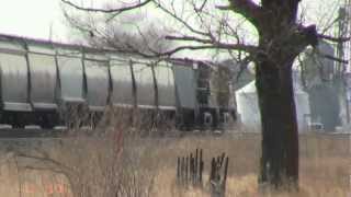 preview picture of video 'Union Pacific AC44CW No. 7141 leads a grain train near Gothenburg, Nebraska, April 2011'