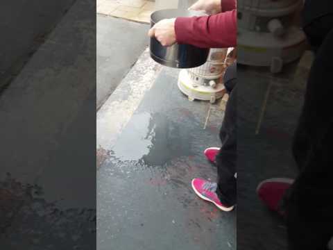 Car dent removal with hot water and toilet plunger.