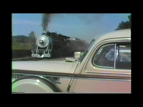 889. OP&E # 19 STEAM TRAIN depart Station depot past old car on the Oregon Pacific & Eastern Cottage