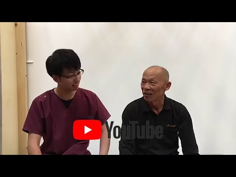 男性の患者さんと院長が会話をしている画像