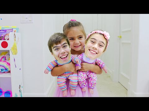 Nastya found the boy doll and pretends to be his parent