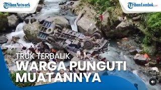 Sebuah Truk Terjun ke Sungai di Sitinjau Lauik, Warga Punguti Muatan Berupa Susu