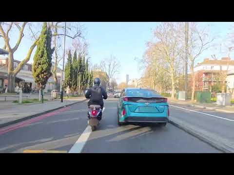 Busy Thursday morning rush hour in London. Cyclist trying to p*** me off.