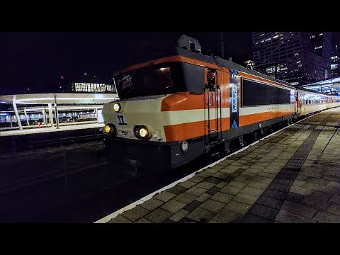 The 16-car Alpenexpress departs Utrecht Centraal in the evening - Departure -