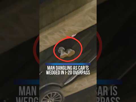 MAN DANGLING AS CAR IS WEDGED IN I-20 OVERPASS