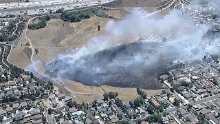 Brush fire erupts in Sylmar, threatening homes and prompting massive firefighter response l ABC7