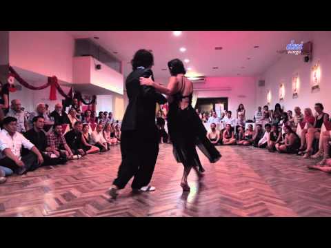  Moira Castellano  and  Gaston Torelli  are  dancing  to  a  tango  at  Mar del Plata Vive Tango  in  2014