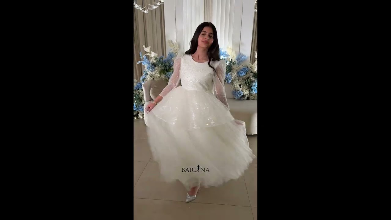 فستان أبيض منفوش بأكمام شفافة - سنة