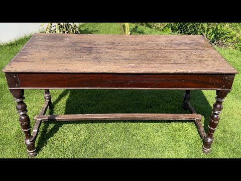 Restoration a faded antique table with outdated tools