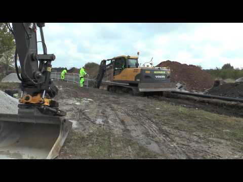 Volvo EC 160 CL digging for sewer outside Visby in Full HD 2014